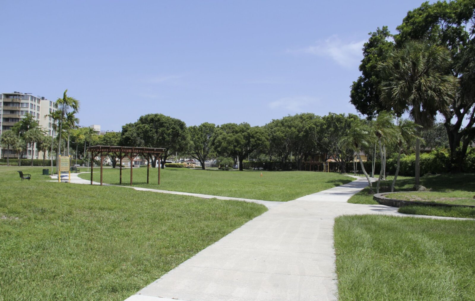 Paved pathway in a park field